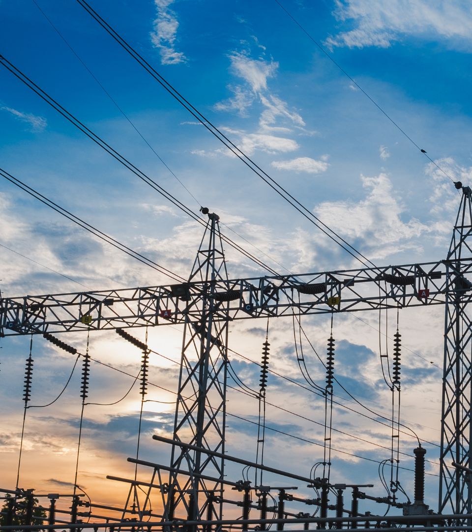 High-voltage substation against the evening sky